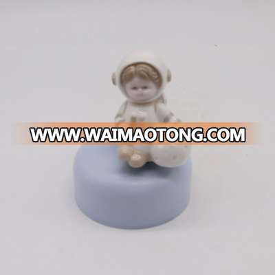 Astronauts figure ceramic music box small porcelain figurine